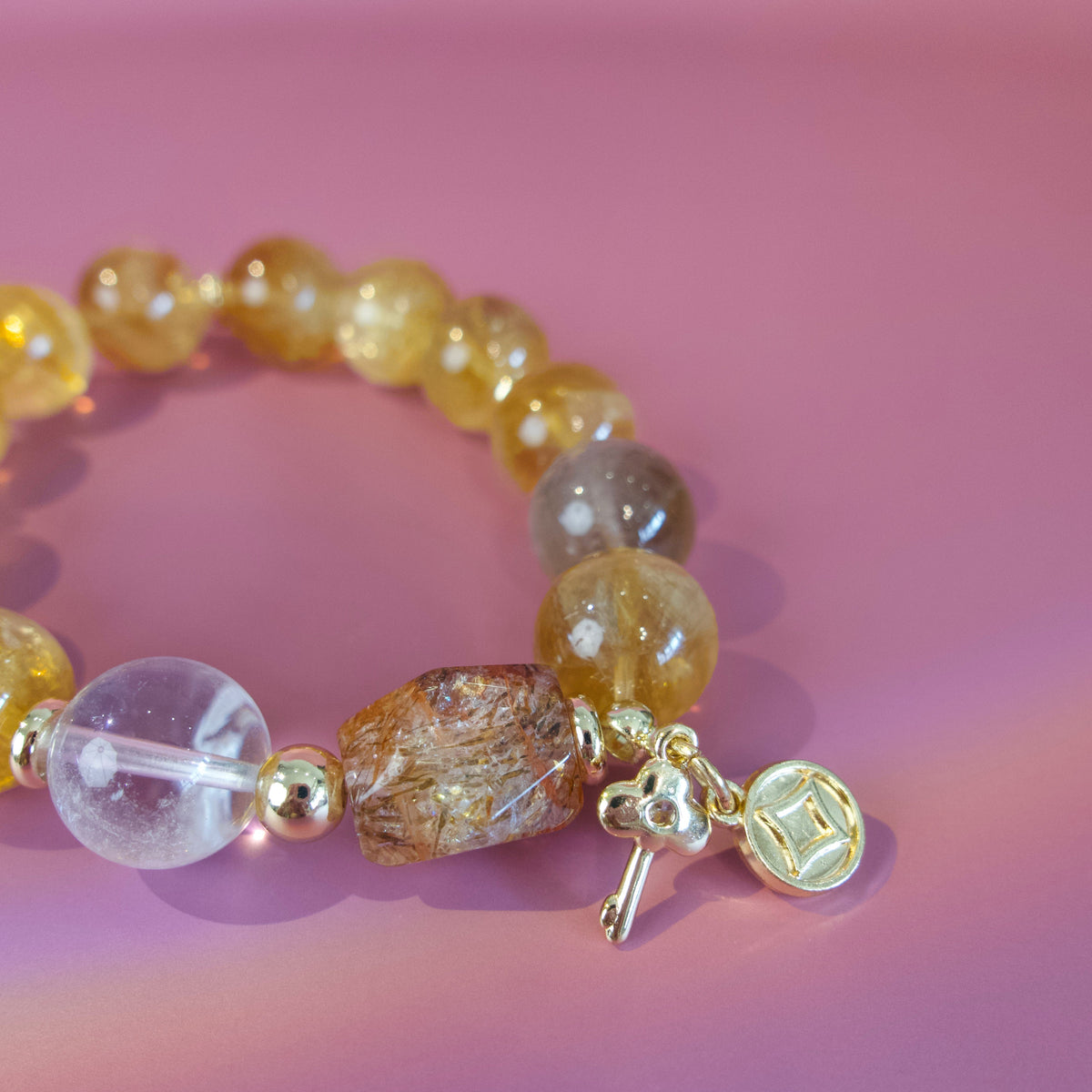 Golden natural stone bracelet worn on wrist