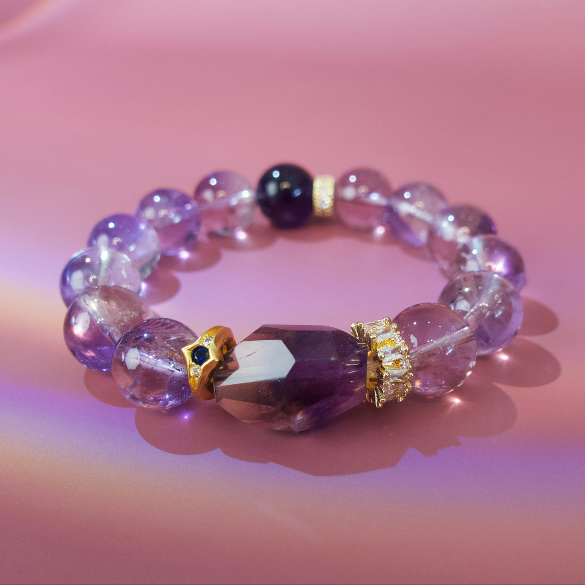 Brazilian amethyst and Super Seven crystal bracelet with gold details