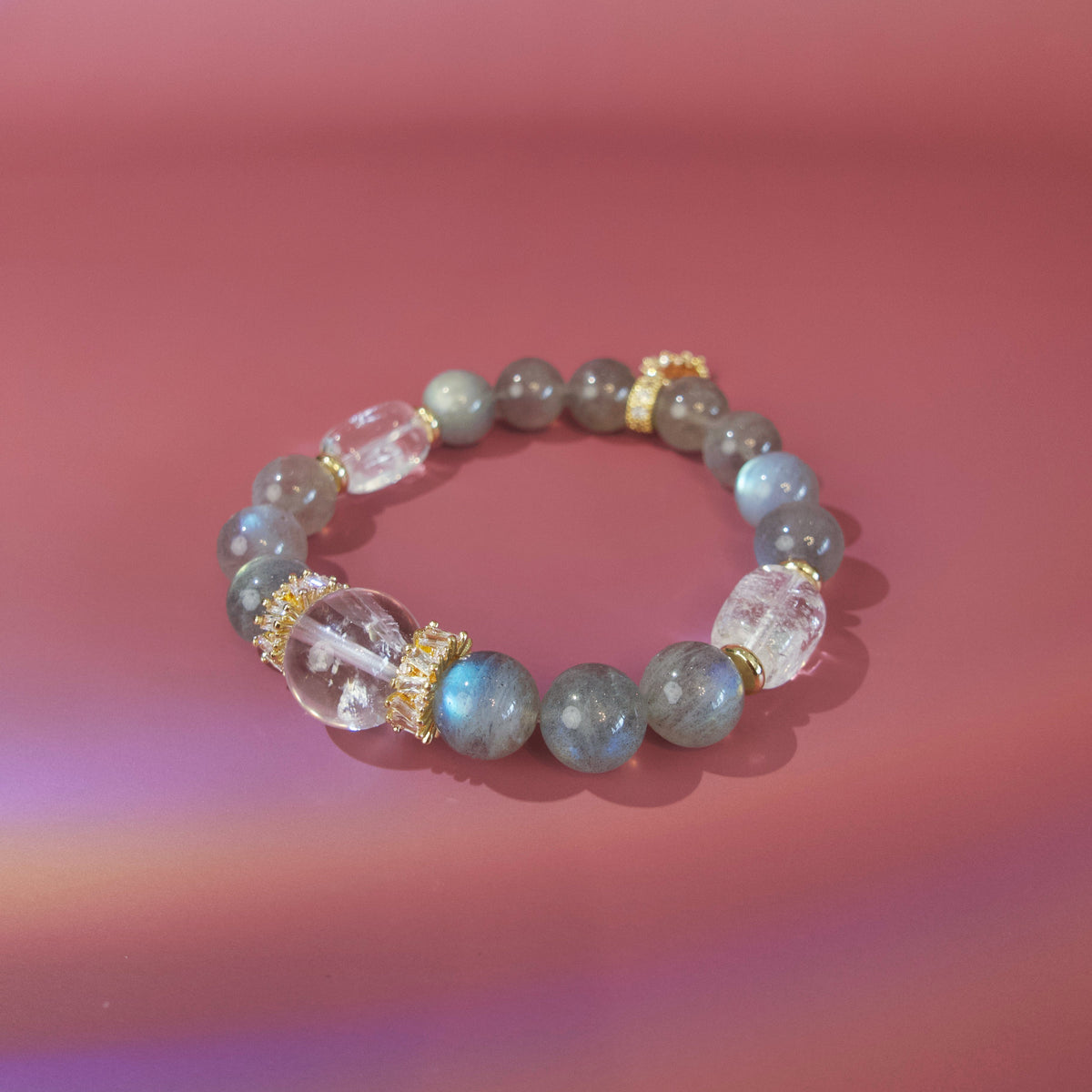 Blue flash grey moonstone beads and white crystal focal bead