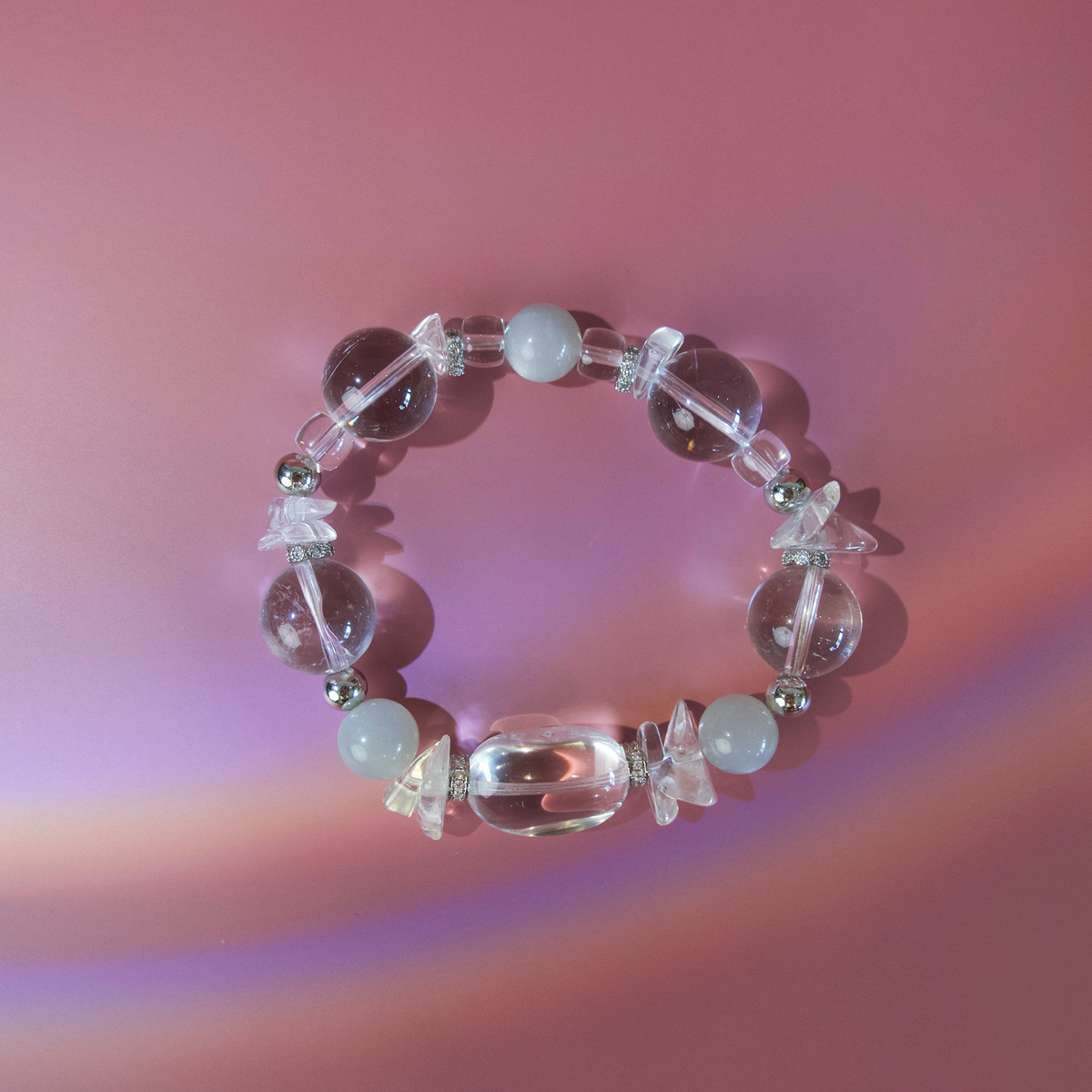 Clear quartz focal bead and white moonstone details