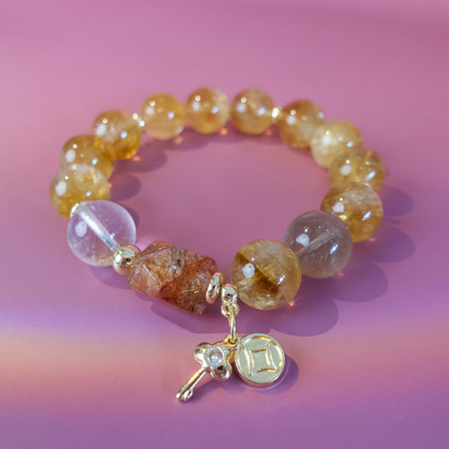 Golden natural crystal bracelet designed around abundance and receiving
