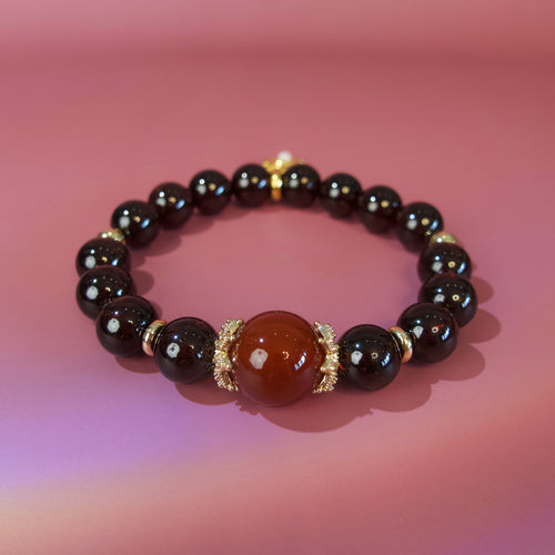 Red natural stone bracelet designed around vitality and courage