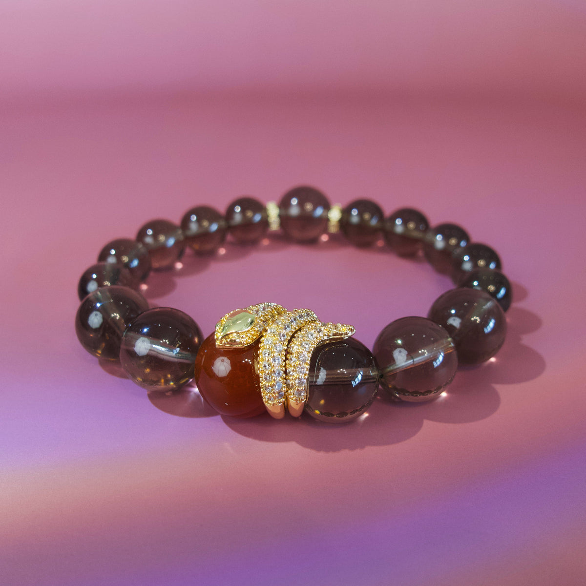 Smoky quartz and red agate bracelet with gold snake detail